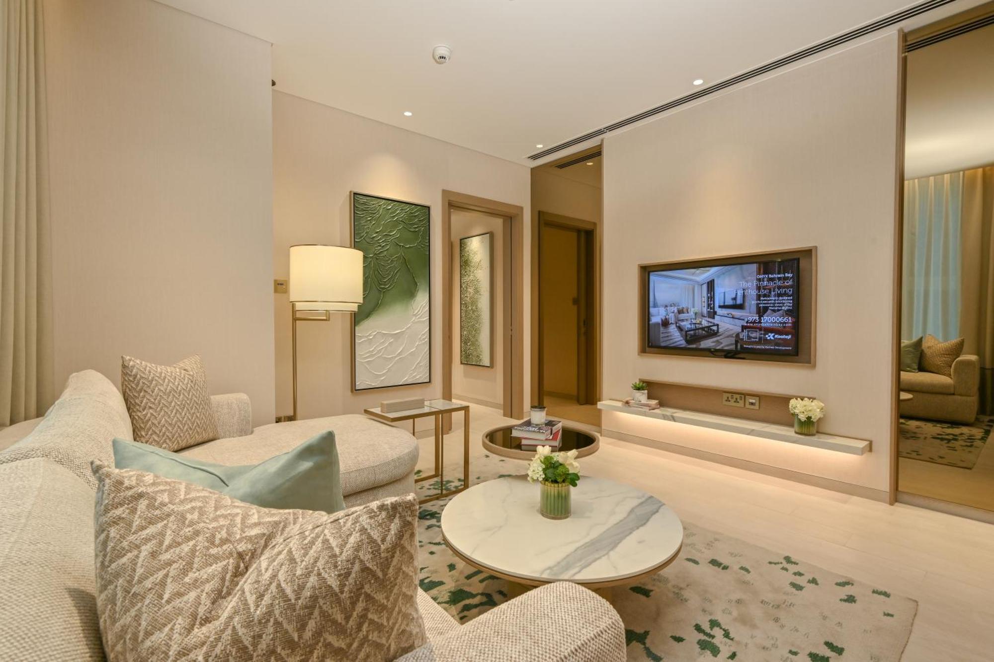 Hotel Onyx Rotana à Manama Extérieur photo Living room